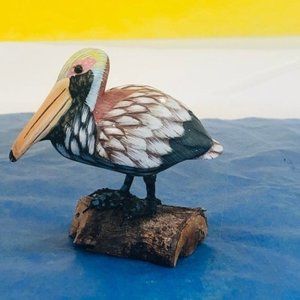 Pelican standing on a Tree Trunk, Handcrafted